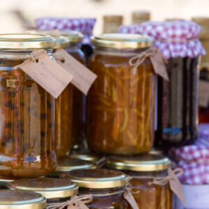 Jars with passion fruit jams at the street fair