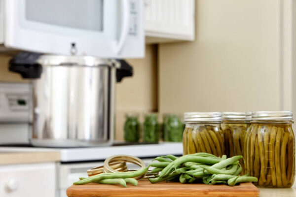 Green beans in a traditional process of canning and preserving at home